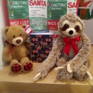 Notebook, Two Stuffed animals.